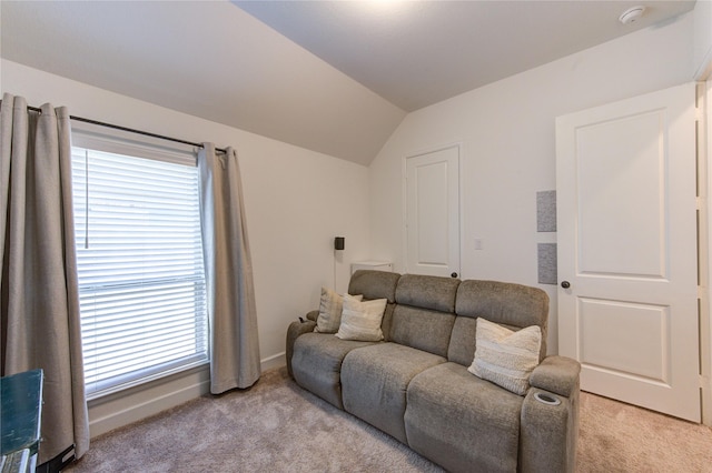 20447 Avelignese Way, Tomball, TX 77377 - living room with baseboards, light carpet, and vaulted ceiling