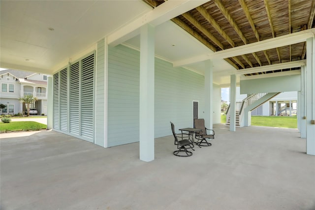 view of patio / terrace featuring stairway