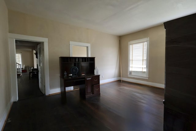 1811 Beasley W End Rd, Beasley, TX 77417 - home office featuring plenty of natural light, baseboards, and dark wood-type flooring