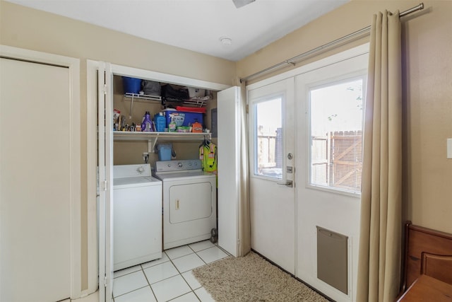 1900 Dartmouth St Unit C2, College Station, TX 77840 - laundry room with laundry area, washer and clothes dryer, and light tile patterned flooring