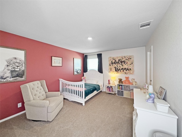 carpeted bedroom with visible vents