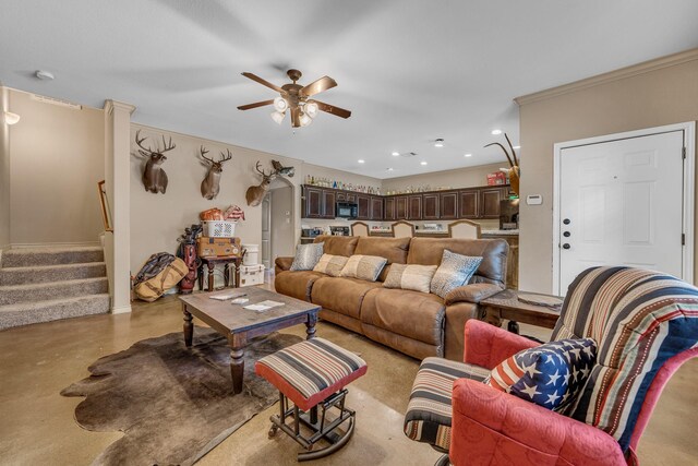3338 Cullen Trl, College Station, TX 77845 - living area with a ceiling fan, recessed lighting, baseboards, stairs, and concrete flooring