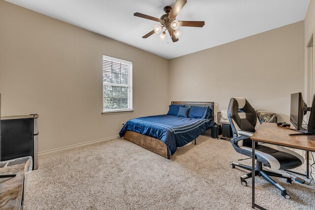 3338 Cullen Trl, College Station, TX 77845 - carpeted bedroom with baseboards and a ceiling fan