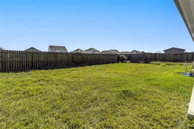 13938 Red River Dr, Baytown, TX 77523 - view of yard featuring a fenced backyard