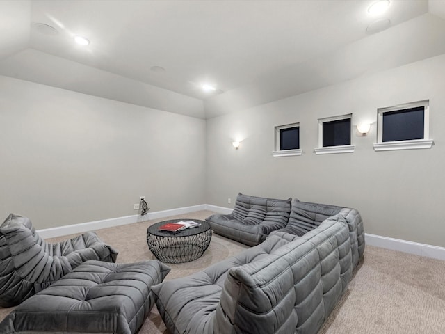 living room with baseboards, recessed lighting, carpet, and vaulted ceiling