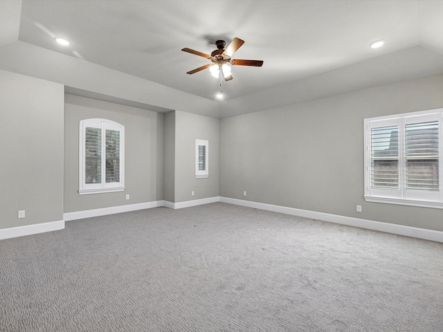 empty room featuring light carpet, baseboards, ceiling fan, and recessed lighting