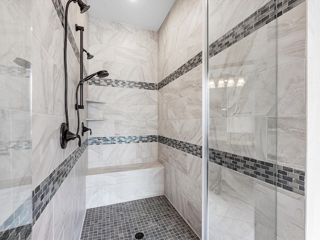 full bathroom featuring a stall shower