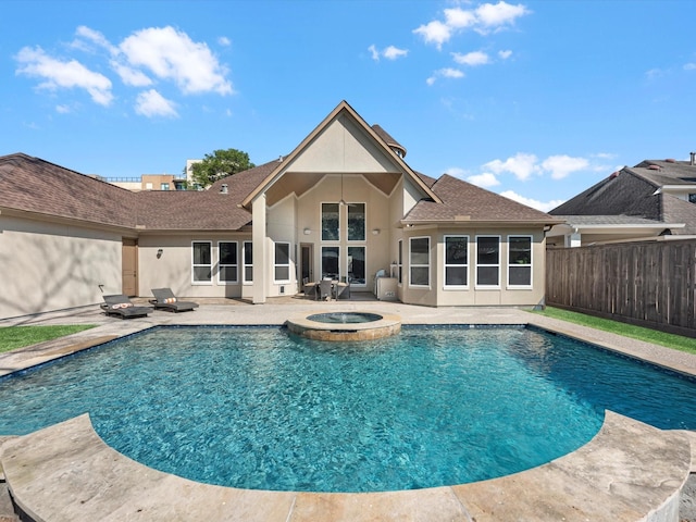 view of pool with a patio area, an in ground hot tub, fence, and a fenced in pool