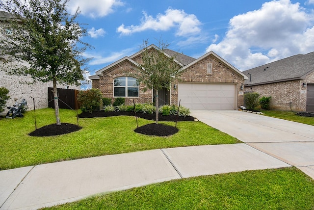 view of front of house featuring brick siding, fence, an attached garage, concrete driveway, and a front lawn