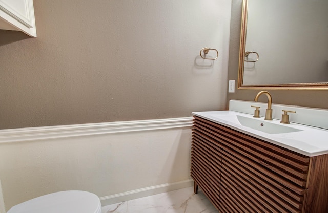 11022 Riverview Dr, Houston, TX 77042 - bathroom with vanity, toilet, and marble finish floor