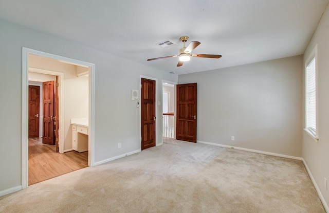 11022 Riverview Dr, Houston, TX 77042 - unfurnished bedroom featuring carpet, visible vents, and baseboards