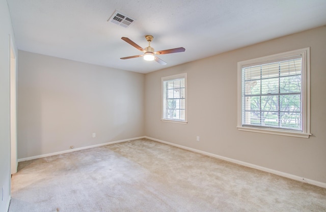 11022 Riverview Dr, Houston, TX 77042 - spare room featuring baseboards, ceiling fan, visible vents, and carpet