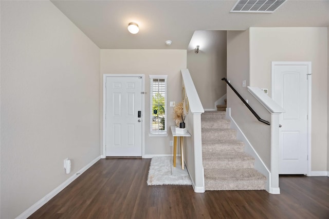 3730 Giorgio Pastel Pl, Katy, TX 77493 - foyer entrance with stairs, baseboards, visible vents, and wood finished floors