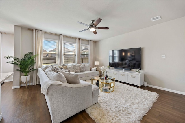 3730 Giorgio Pastel Pl, Katy, TX 77493 - living room with baseboards, dark wood-style flooring, visible vents, and ceiling fan