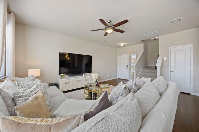 3730 Giorgio Pastel Pl, Katy, TX 77493 - living area featuring visible vents, wood finished floors, baseboards, and ceiling fan