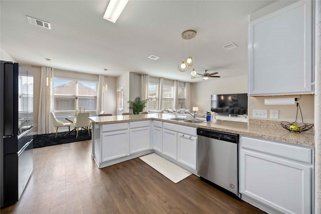 3730 Giorgio Pastel Pl, Katy, TX 77493 - kitchen featuring freestanding refrigerator, stainless steel dishwasher, visible vents, and a sink