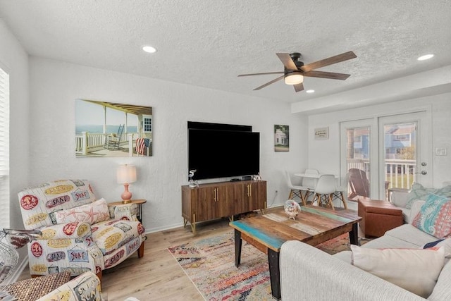 501 Jean Lafitte Cv, Galveston, TX 77554 - living area with a ceiling fan, recessed lighting, a textured ceiling, and wood finished floors