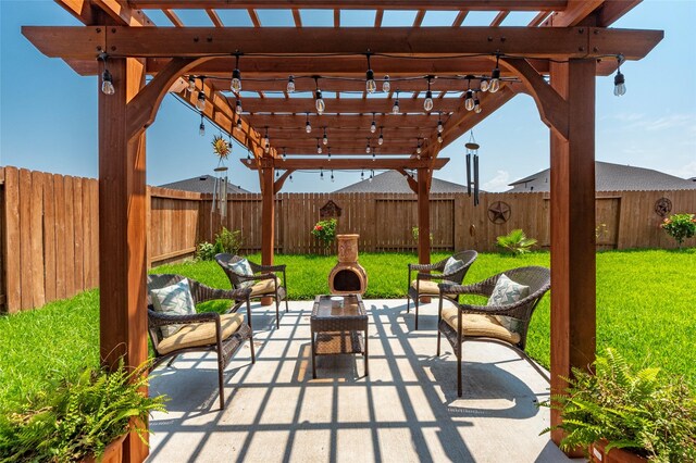 9705 Wall St, Texas City, TX 77591 - view of patio featuring a pergola, an outdoor hangout area, and a fenced backyard