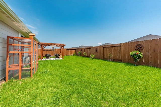 9705 Wall St, Texas City, TX 77591 - view of yard with a patio, a pergola, and a fenced backyard