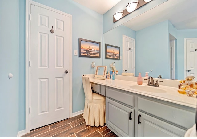 9203 Baber Run Cir, Houston, TX 77095 - bathroom with wood tiled floors, vanity, and baseboards