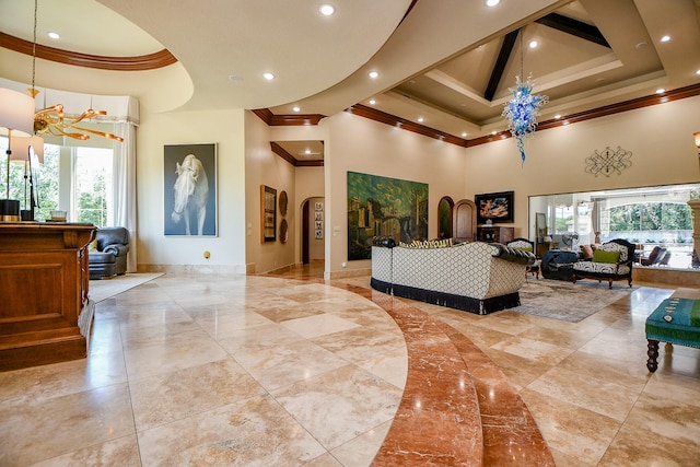 2718 Silverhorn Dr, Katy, TX 77450 - living area featuring ornamental molding, a high ceiling, arched walkways, plenty of natural light, and recessed lighting