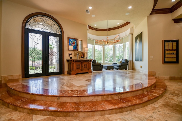 2718 Silverhorn Dr, Katy, TX 77450 - entrance foyer with marble tiled flooring, a chandelier, crown molding, recessed lighting, and a high ceiling