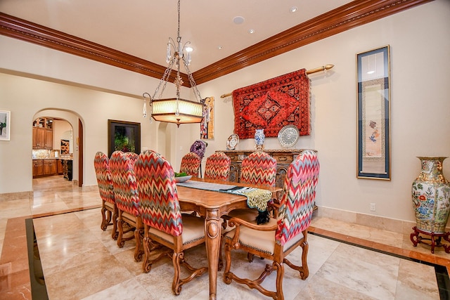 2718 Silverhorn Dr, Katy, TX 77450 - dining space with ornamental molding, arched walkways, inlaid floor details, recessed lighting, and light tile patterned flooring