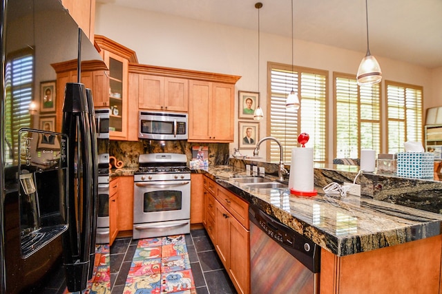 2718 Silverhorn Dr, Katy, TX 77450 - kitchen featuring appliances with stainless steel finishes, decorative backsplash, a peninsula, glass insert cabinets, and dark tile patterned flooring