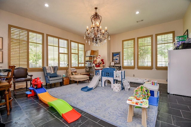 2718 Silverhorn Dr, Katy, TX 77450 - recreation room featuring plenty of natural light, a chandelier, and recessed lighting