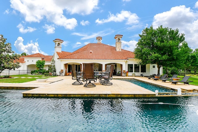 2718 Silverhorn Dr, Katy, TX 77450 - view of swimming pool featuring a patio and a water view