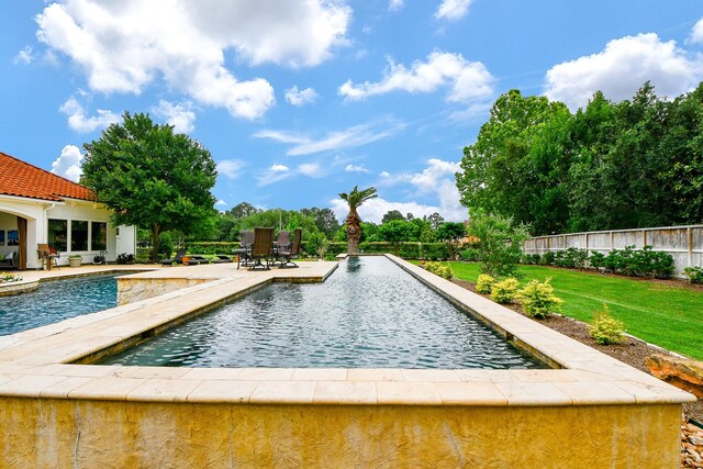 2718 Silverhorn Dr, Katy, TX 77450 - swimming pool with a patio area