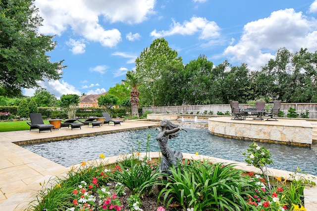 2718 Silverhorn Dr, Katy, TX 77450 - outdoor pool with a patio area and outdoor dining area