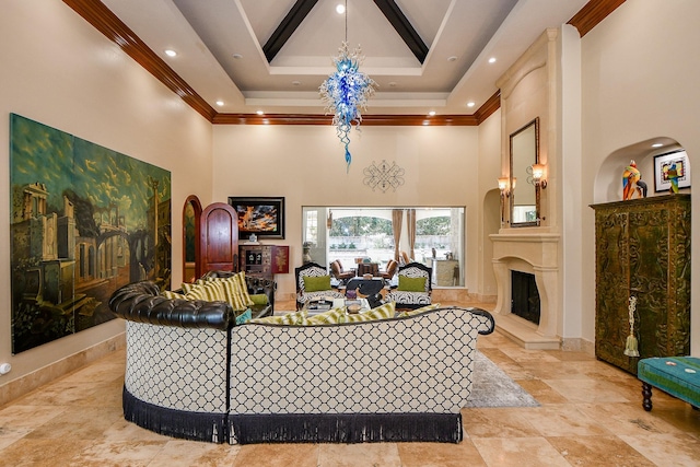 2718 Silverhorn Dr, Katy, TX 77450 - living area with a towering ceiling, a large fireplace, ornamental molding, and recessed lighting