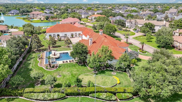 2718 Silverhorn Dr, Katy, TX 77450 - aerial perspective of suburban area featuring a pool and a nearby body of water