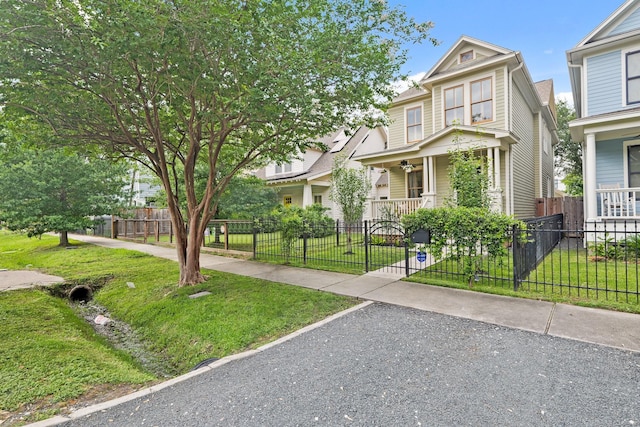 victorian house featuring a porch