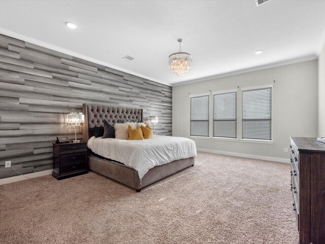 bedroom featuring a chandelier, carpet floors, ornamental molding, baseboards, and recessed lighting