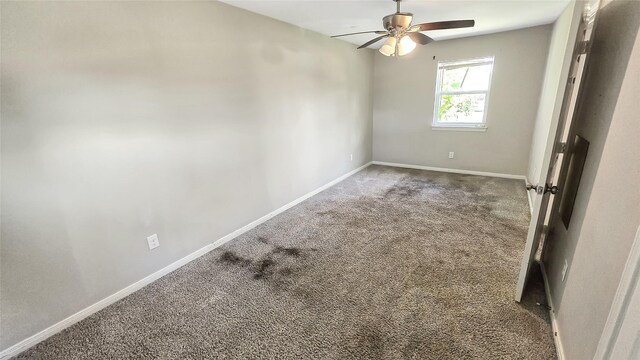 1314 Burbank St, Baytown, TX 77520 - carpeted spare room featuring baseboards and ceiling fan