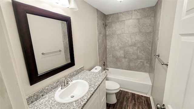 1314 Burbank St, Baytown, TX 77520 - full bathroom with toilet, wood finished floors, vanity, and  shower combination