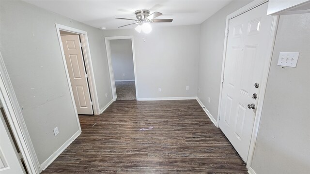 1314 Burbank St, Baytown, TX 77520 - unfurnished room with baseboards, ceiling fan, and dark wood-style floors