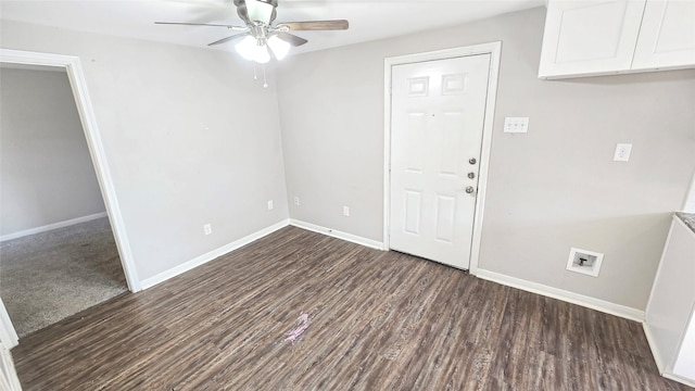 1314 Burbank St, Baytown, TX 77520 - spare room with dark wood finished floors, baseboards, and ceiling fan