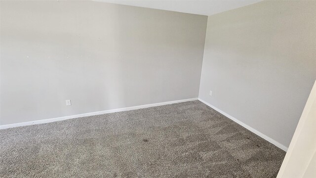 1314 Burbank St, Baytown, TX 77520 - empty room featuring carpet flooring and baseboards