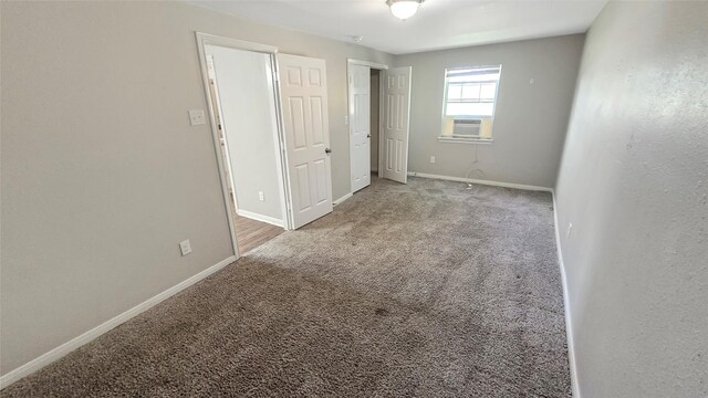 1314 Burbank St, Baytown, TX 77520 - unfurnished bedroom featuring carpet flooring, baseboards, and cooling unit
