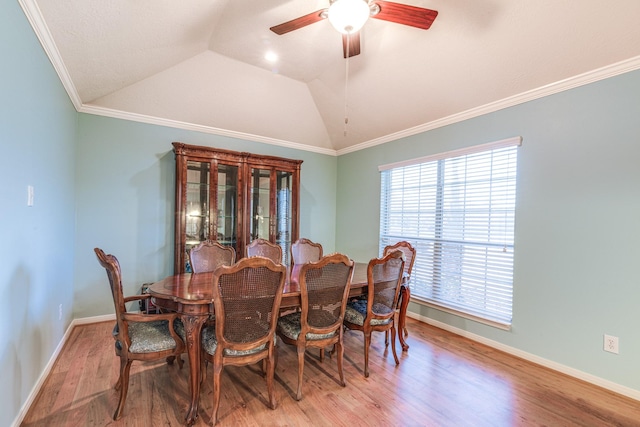 410 Scarlet Sage Dr, League City, TX 77573 - dining area with light wood-style floors, ceiling fan, lofted ceiling, and ornamental molding