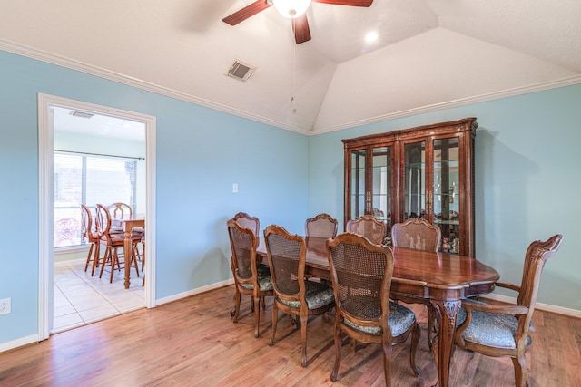 410 Scarlet Sage Dr, League City, TX 77573 - dining space with a ceiling fan, lofted ceiling, light wood-style floors, and crown molding