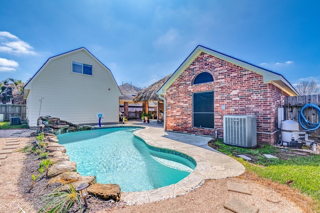 410 Scarlet Sage Dr, League City, TX 77573 - view of swimming pool featuring a fenced backyard and a patio