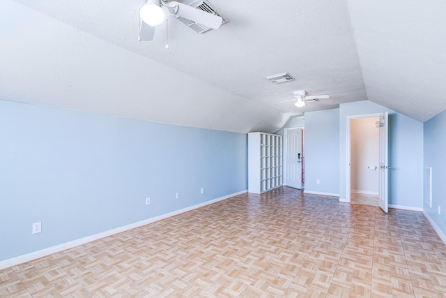 410 Scarlet Sage Dr, League City, TX 77573 - bonus room featuring a ceiling fan, lofted ceiling, and a textured ceiling