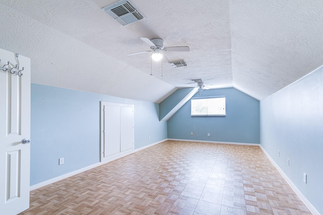 410 Scarlet Sage Dr, League City, TX 77573 - bonus room with a textured ceiling, a ceiling fan, and lofted ceiling