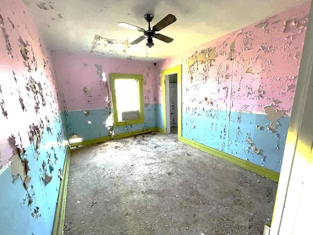 unfurnished room featuring ceiling fan