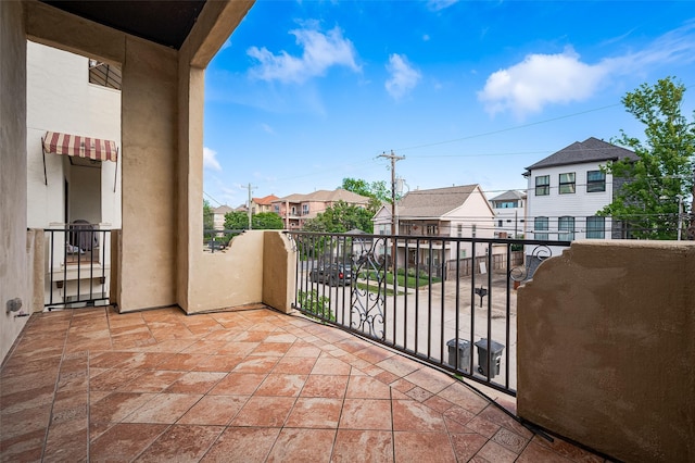 balcony featuring a residential view