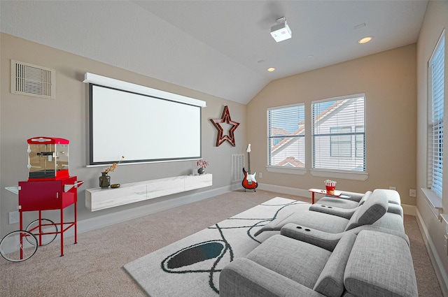 home theater with carpet, visible vents, and baseboards